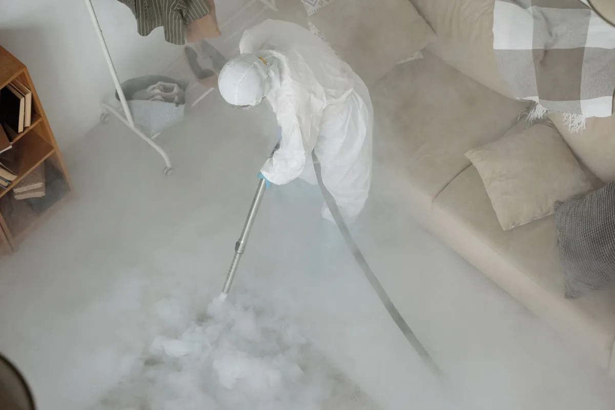 Biohazard cleanup technician in protective equipment, Summerdale, AL